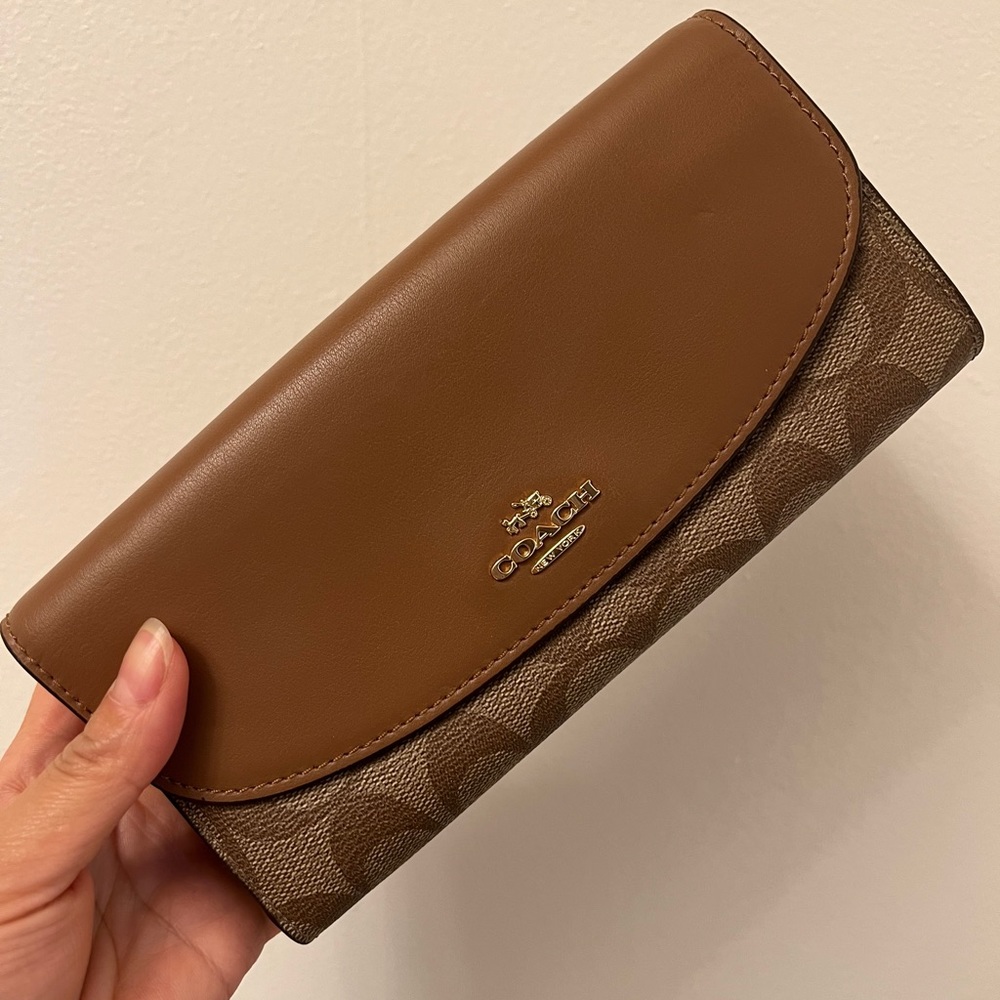 NWT coach signature PVC slim envelope